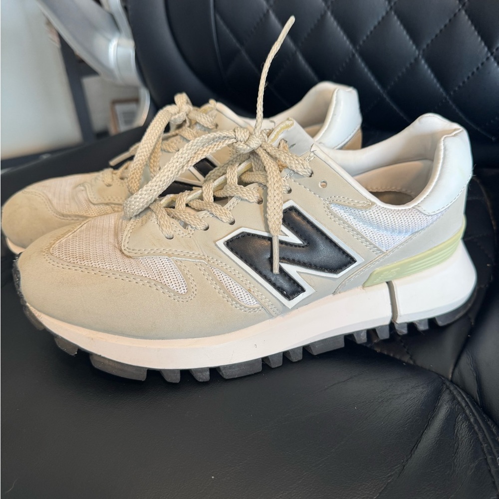 New Balance Cream and Black Sneakers